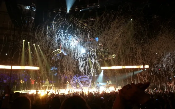 Garth Brooks performing during an arena concert