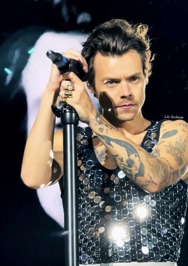 Harry Styles performing at Wembley Stadium during Love On Tour in 2022