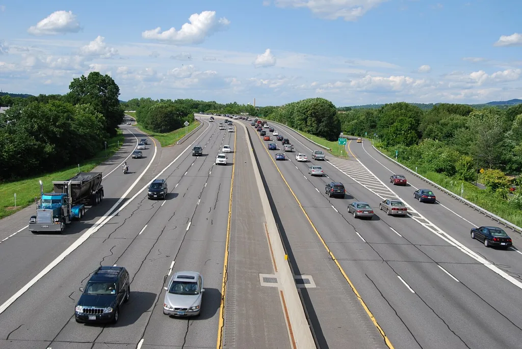 Cars traveling on a multi-lane highway during a busy travel period