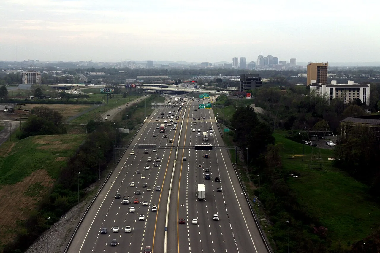Open the featured image for Dolly Parton Nashville Airport Renaming Extends Her Legacy Beyond Music Interstate 40 near Nashville International Airport in Tennessee