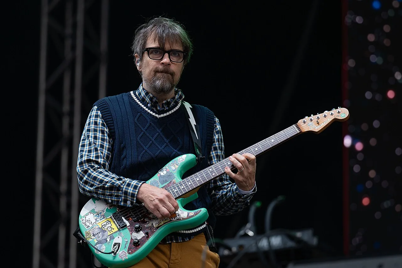 Open the featured image for Weezer Gold Album Strategy Turns Rivers Cuomo’s Fan Data Into a New Creative Plan Rivers Cuomo performing with Weezer at Tons of Rock in 2025