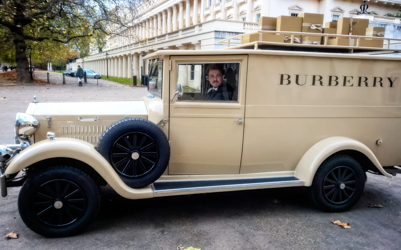 Burberry-branded vintage delivery van in London representing the British luxury house