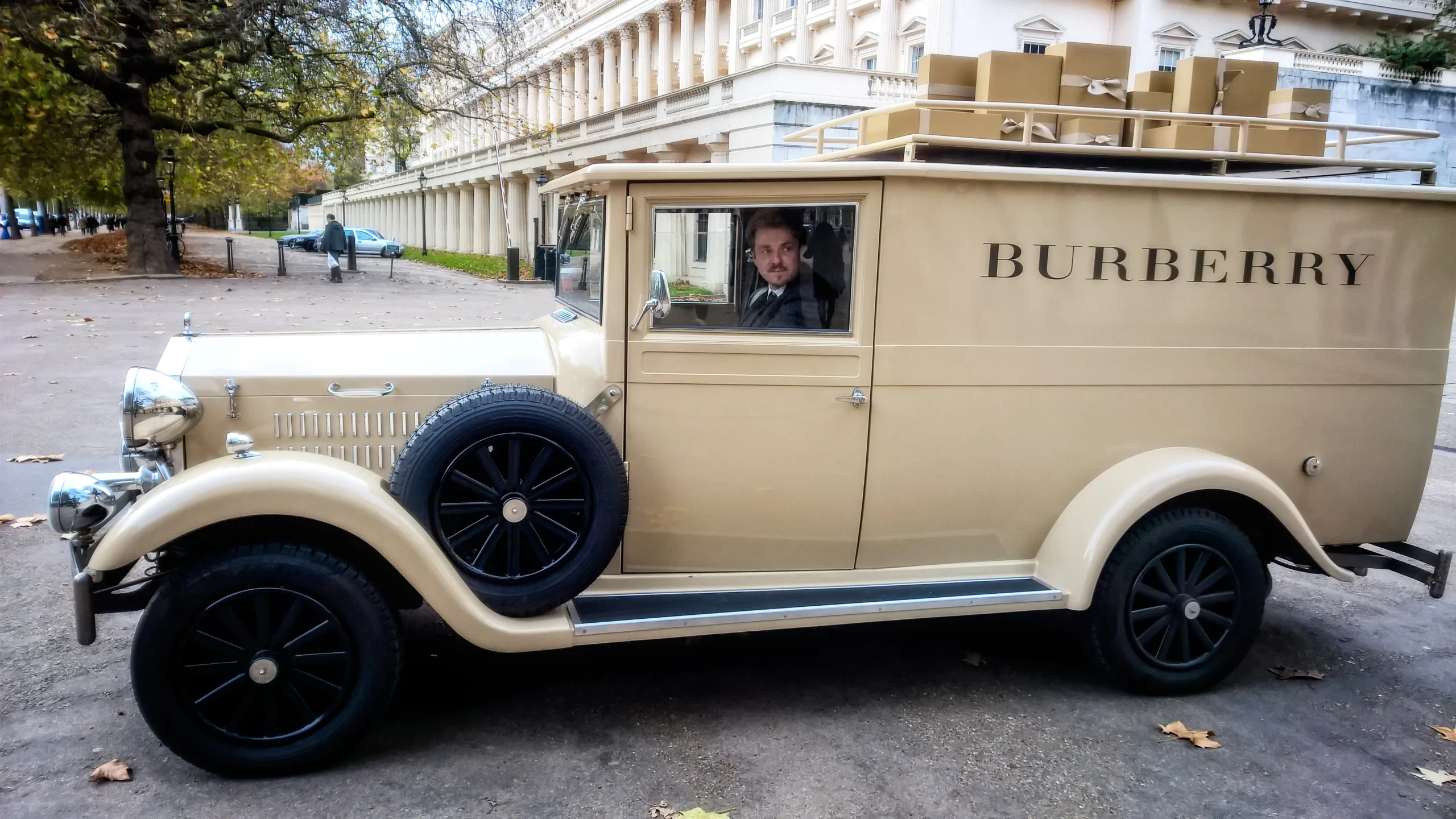 Burberry-branded vintage delivery van in London representing the British luxury house
