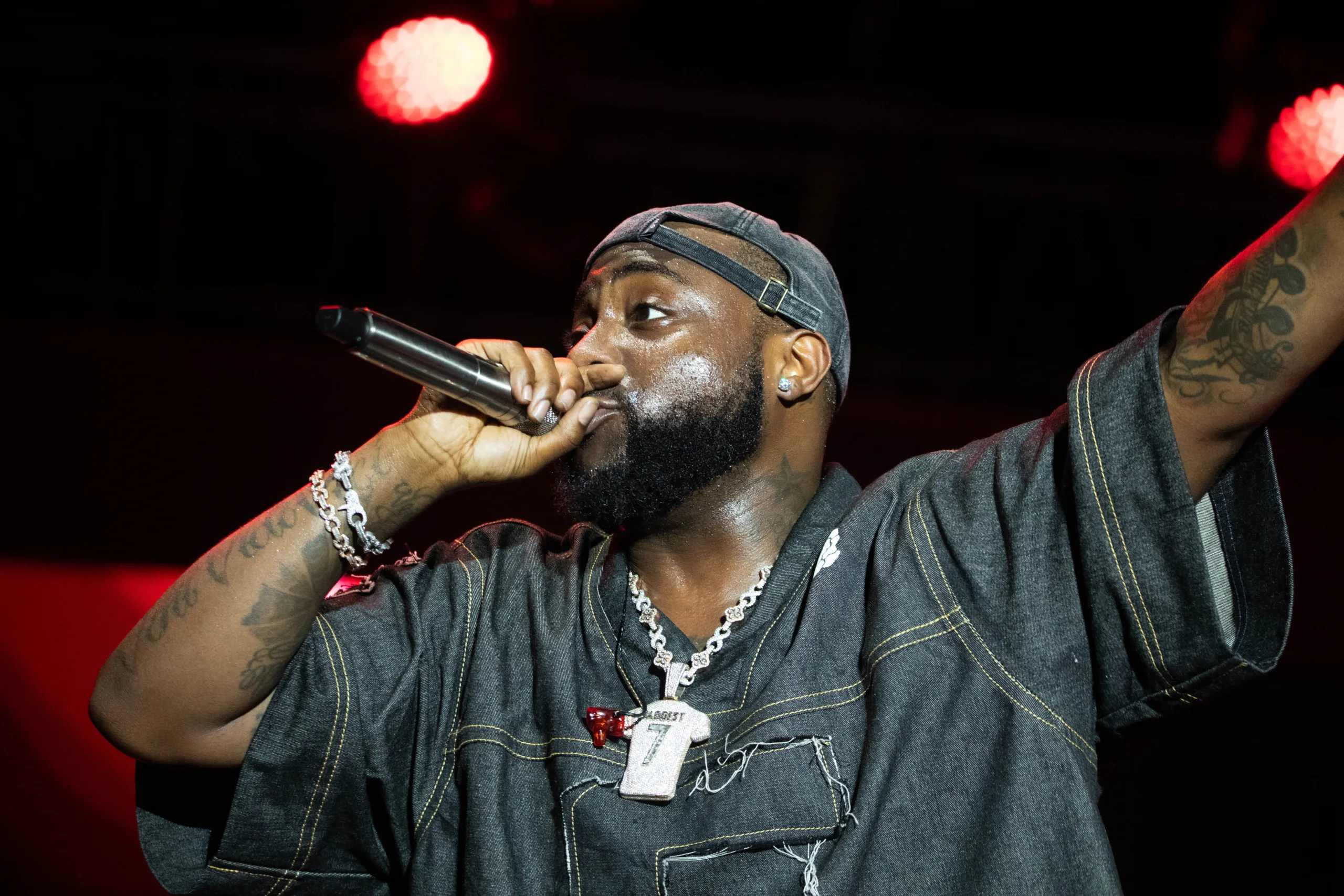 Open the featured image for Davido Erigga Family Money Clash: Why Their Online Feud Blew Up Davido performing onstage at Vodun Days in January 2026