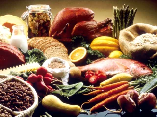 A display of vegetables, fruit, whole grains, protein foods and other nutritious foods