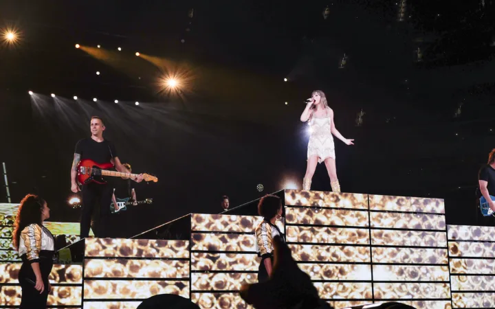 Taylor Swift performing during the Fearless set of the Eras Tour at SoFi Stadium