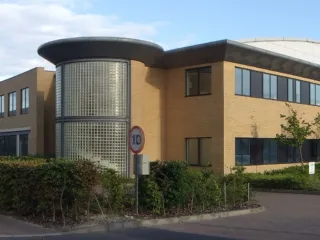 Arm office building at Peterhouse Technology Park in Cambridge in an archival panoramic photograph