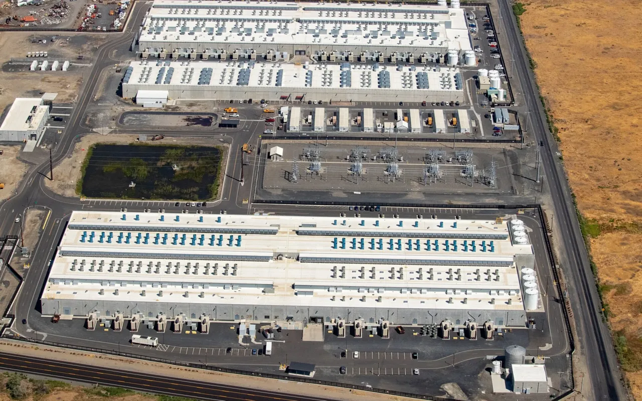 Aerial view of AWS data-centre buildings and electrical infrastructure in Oregon in 2023