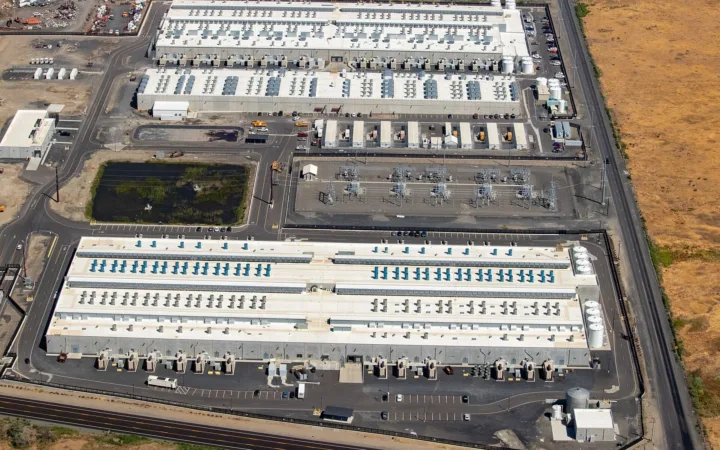 Aerial view of AWS data-centre buildings and electrical infrastructure in Oregon in 2023