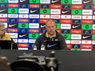 Hansi Flick speaking at a Barcelona press conference in April 2025