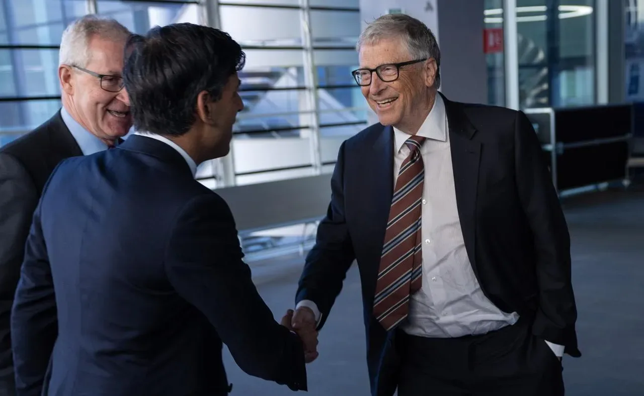 Bill Gates, right, shaking hands with Rishi Sunak at Imperial College London in February 2023