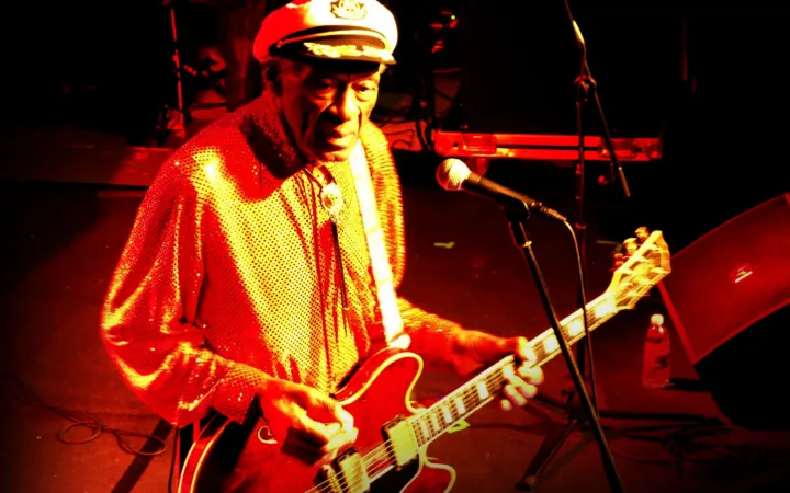 Chuck Berry playing guitar at the Steinegg Live Festival in Italy in October 2013
