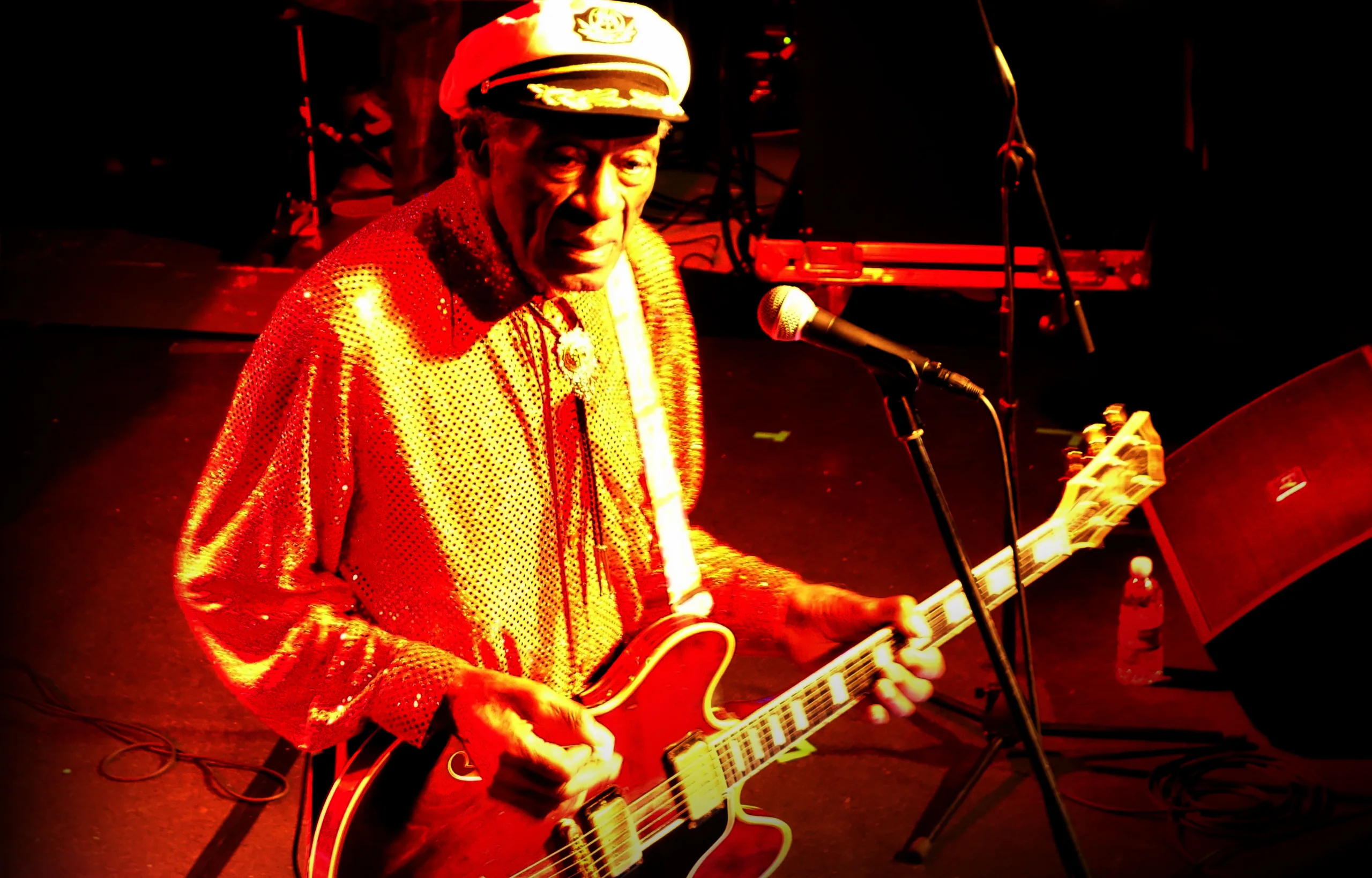 Chuck Berry playing guitar at the Steinegg Live Festival in Italy in October 2013