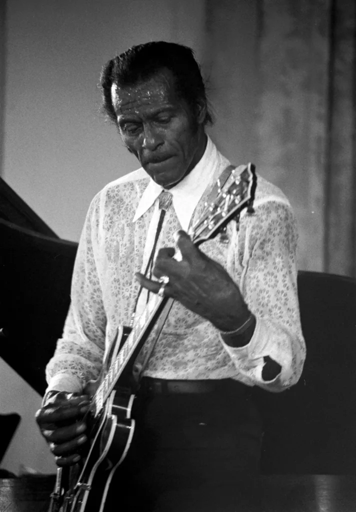 Chuck Berry playing guitar during a concert in Deauville, France, in July 1987