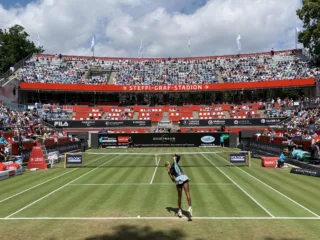Coco Gauff serves at the 2024 Berlin Ladies Open