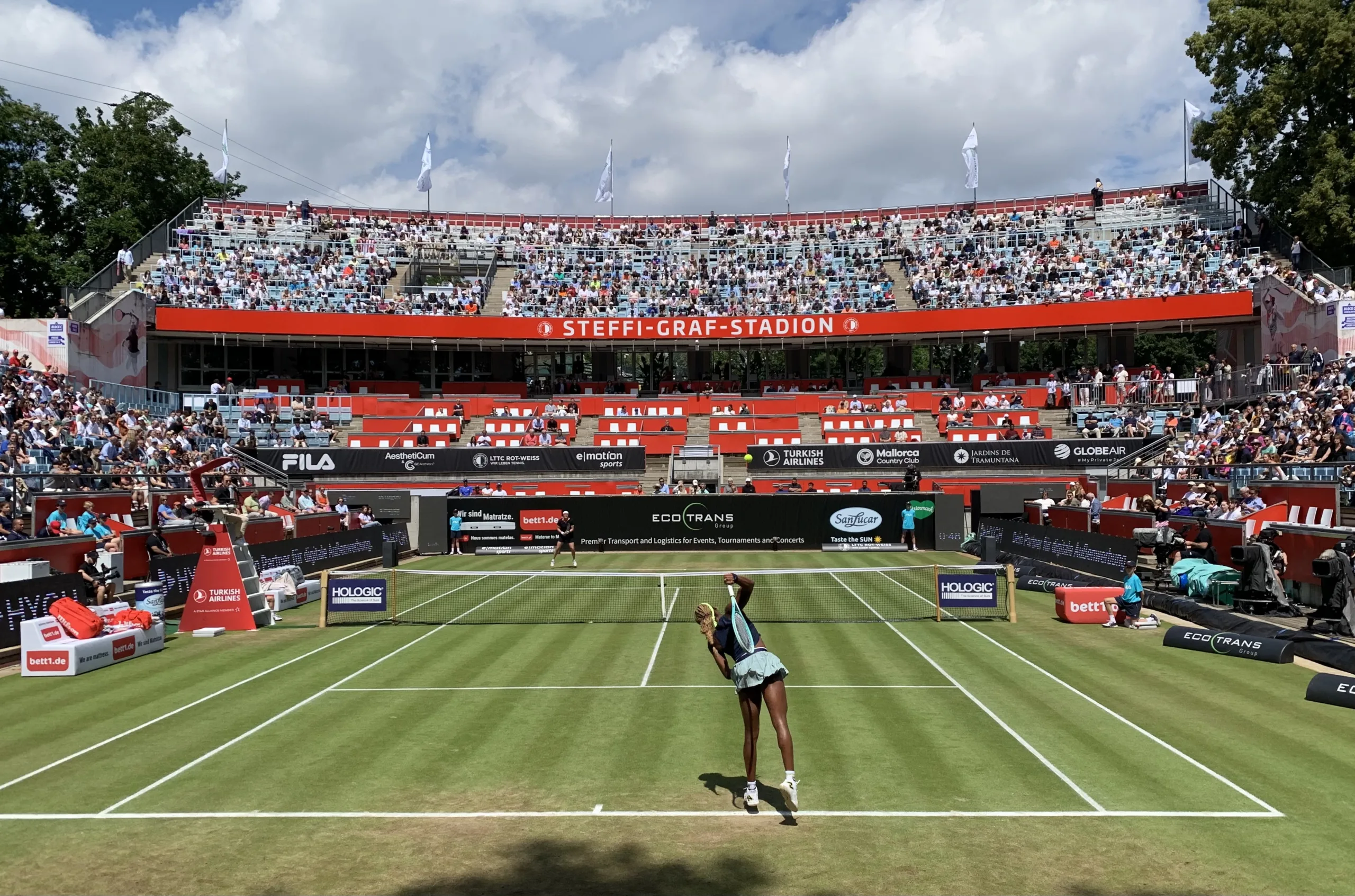 Coco Gauff serves at the 2024 Berlin Ladies Open