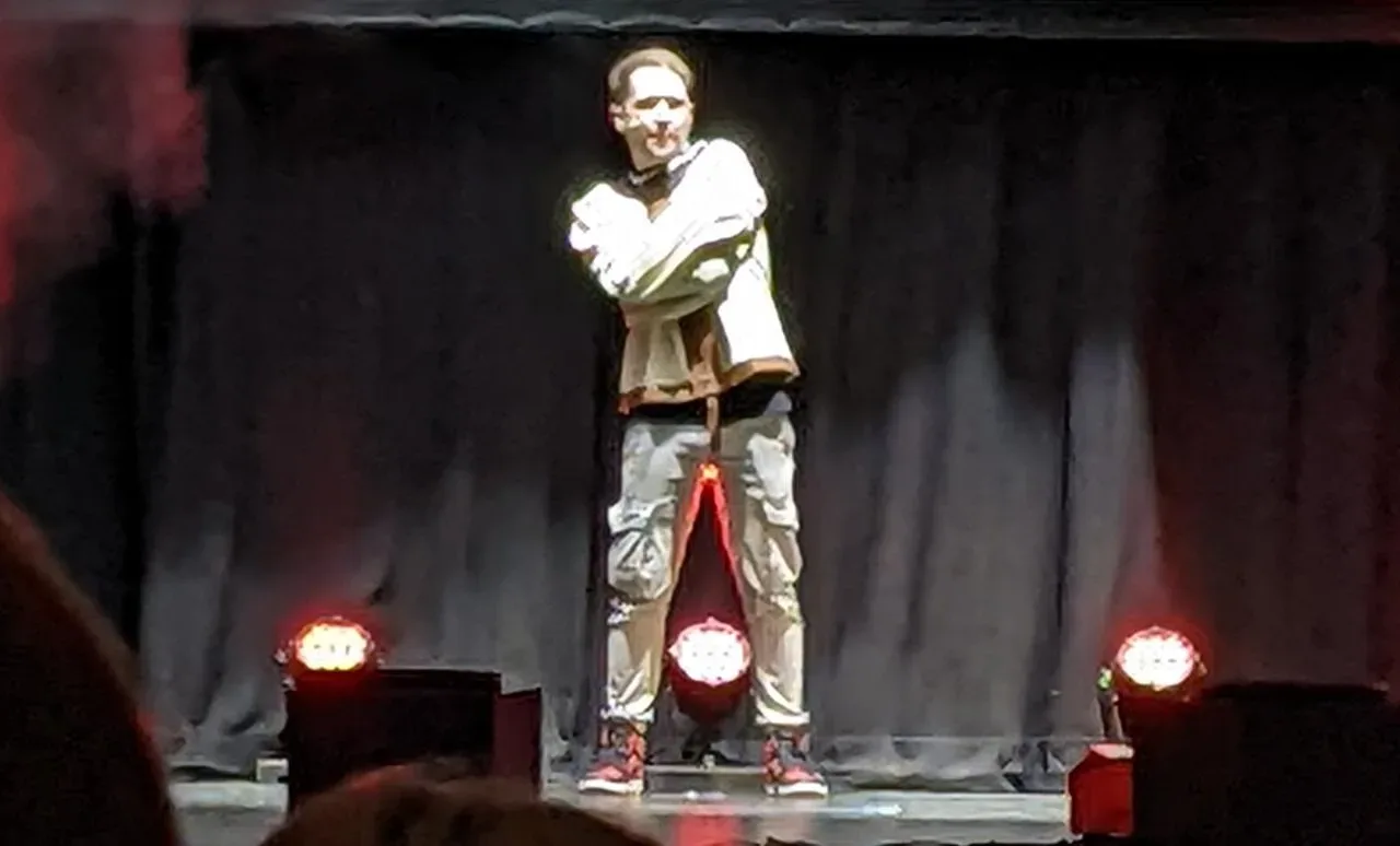 DanTDM performing on stage at the TommyInnit and Friends show in Brighton in 2022
