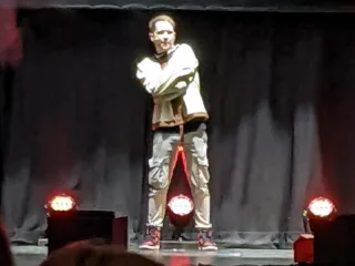 DanTDM performing on stage at the TommyInnit and Friends show in Brighton in 2022