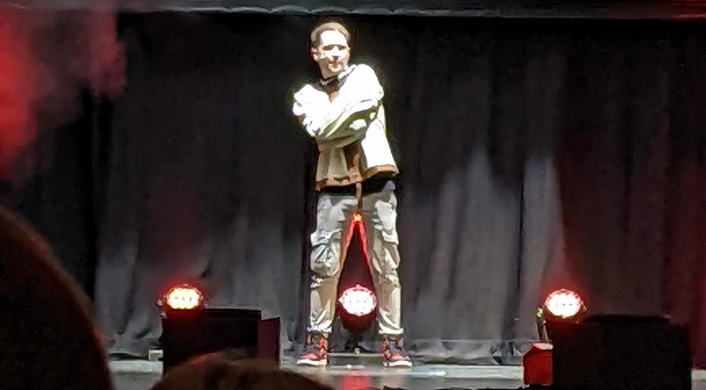 Open the featured image for DanTDM’s Creator Career: From Minecraft to Live Shows DanTDM performing on stage at the TommyInnit and Friends show in Brighton in 2022
