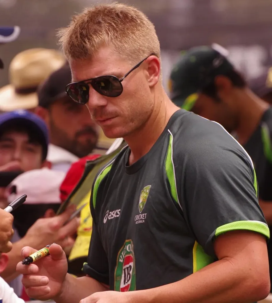 David Warner signing an autograph in Sydney in January 2014