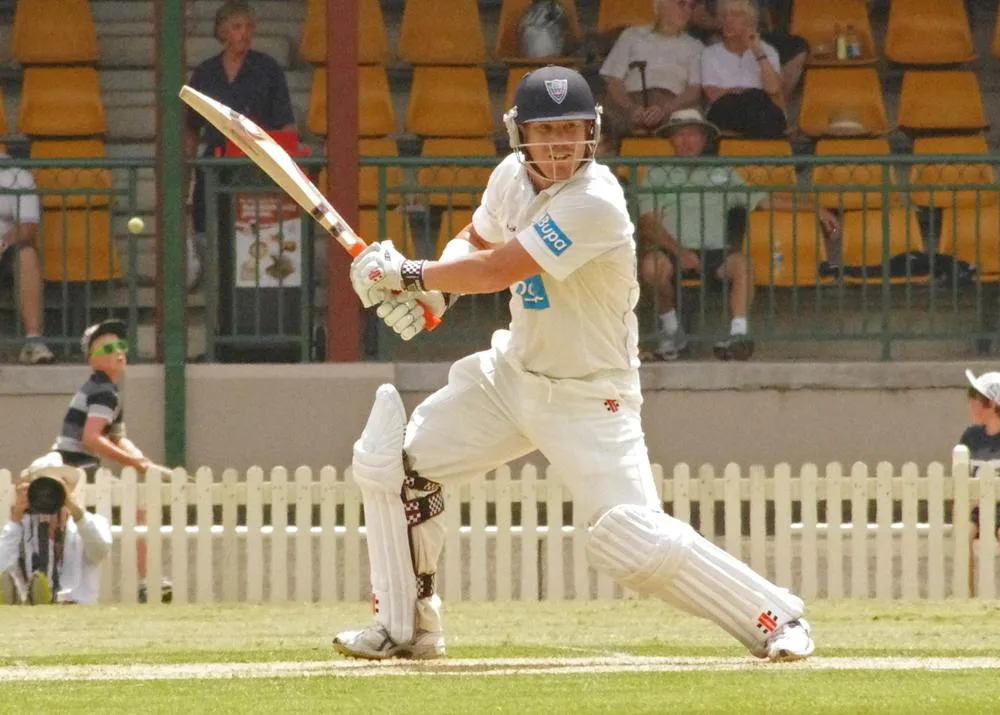 David Warner playing a shot for New South Wales in November 2011