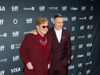 Elton John on the left beside David Furnish at the 2024 Toronto International Film Festival