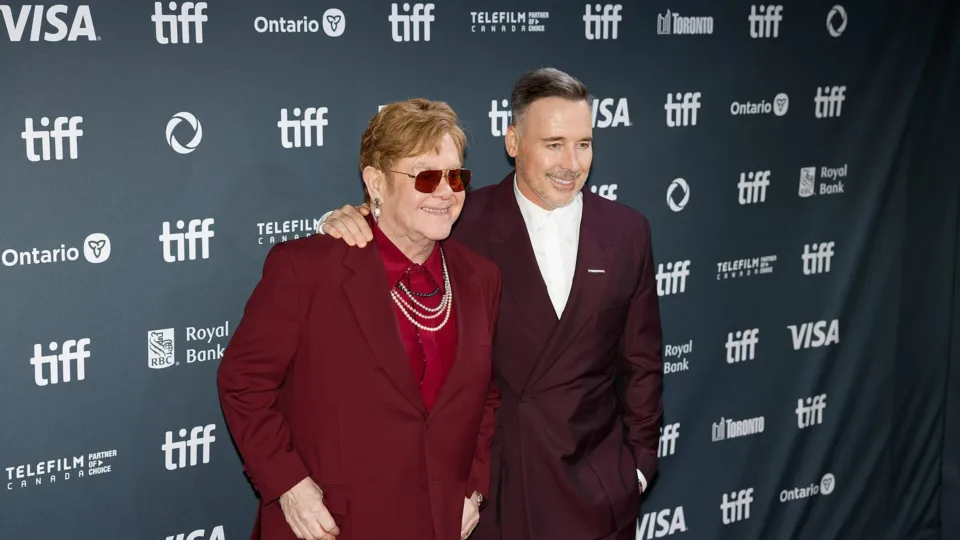 Elton John on the left beside David Furnish at the 2024 Toronto International Film Festival