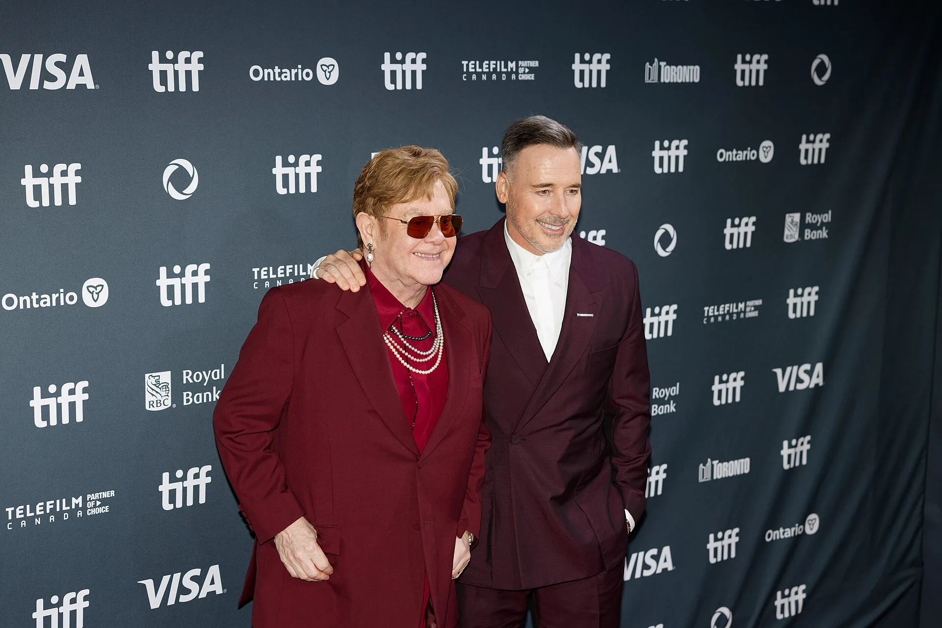 Elton John on the left beside David Furnish at the 2024 Toronto International Film Festival