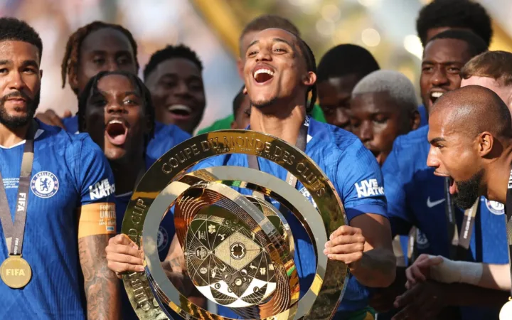 Chelsea players celebrating together after a major 2025 final