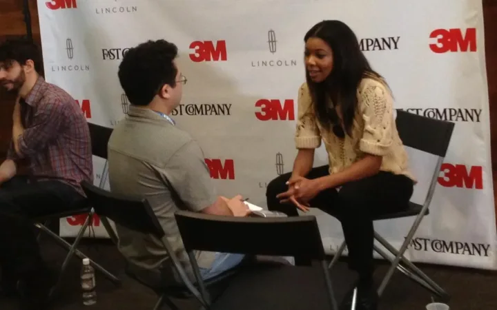Gabrielle Union talking with an interviewer at the Fast Company Grill in 2012