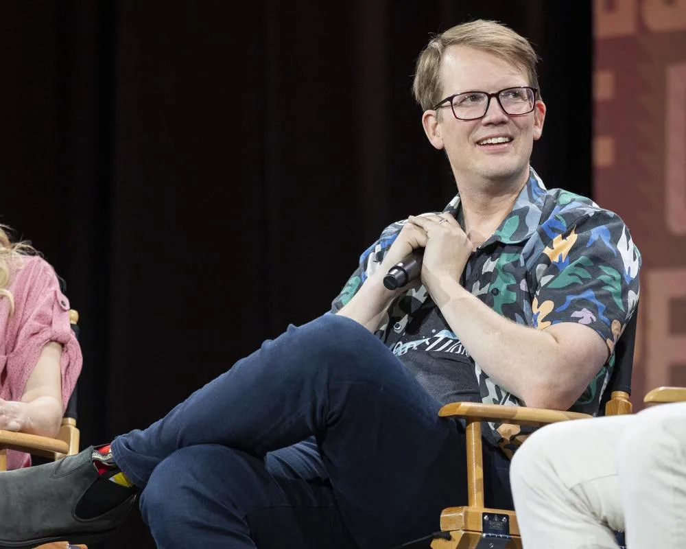 Hank Green speaking at Open Sauce Industry Day in July 2026
