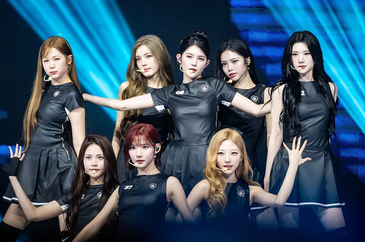 Open the featured image for Spotify CLOSER Gives K-Pop Fandom a Bigger Video Role The eight members of Hearts2Hearts pose together onstage at a 2026 fan event.