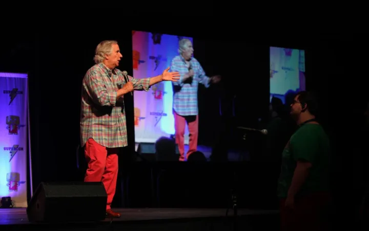 Henry Winkler speaking to an audience at Raleigh Supercon in 2018