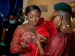 Funke Akindele in a red outfit at the 2021 Africa Movie Academy Awards