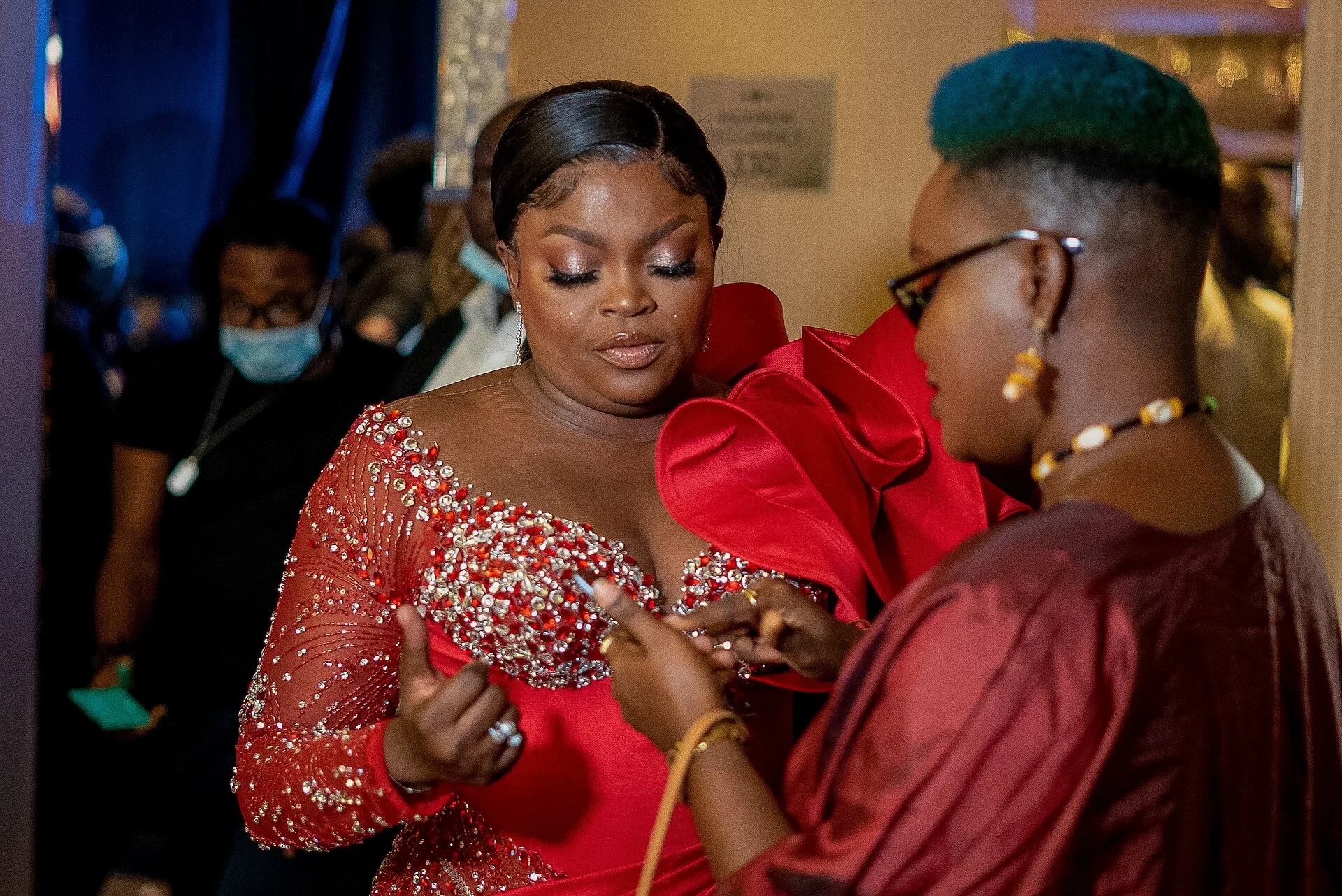Funke Akindele in a red outfit at the 2021 Africa Movie Academy Awards