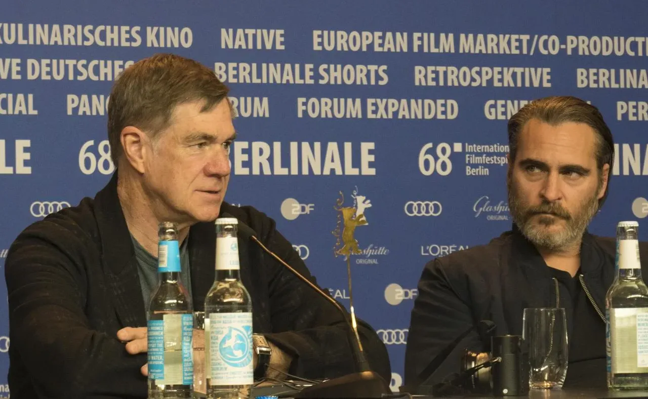 Joaquin Phoenix at right with Gus Van Sant at a Berlin press conference in 2018