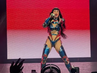 Katy Perry singing on stage during the 2025 Lifetimes Tour in Adelaide