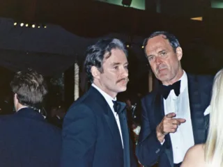 Kevin Kline, left, with John Cleese at the 1989 Oscars Governors Ball
