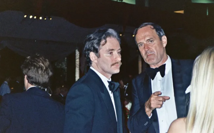 Kevin Kline, left, with John Cleese at the 1989 Oscars Governors Ball