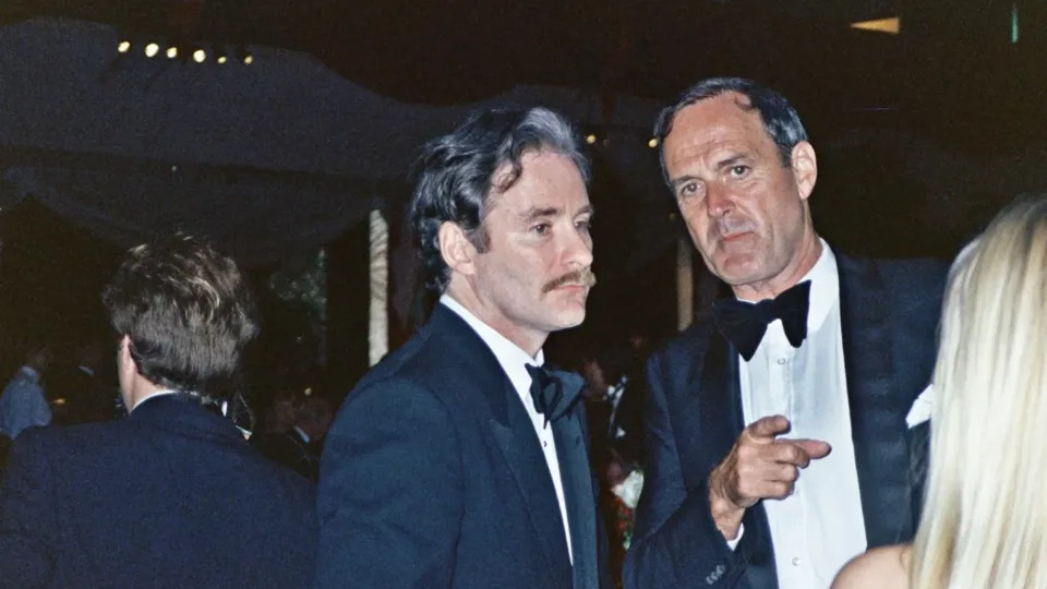 Kevin Kline, left, with John Cleese at the 1989 Oscars Governors Ball