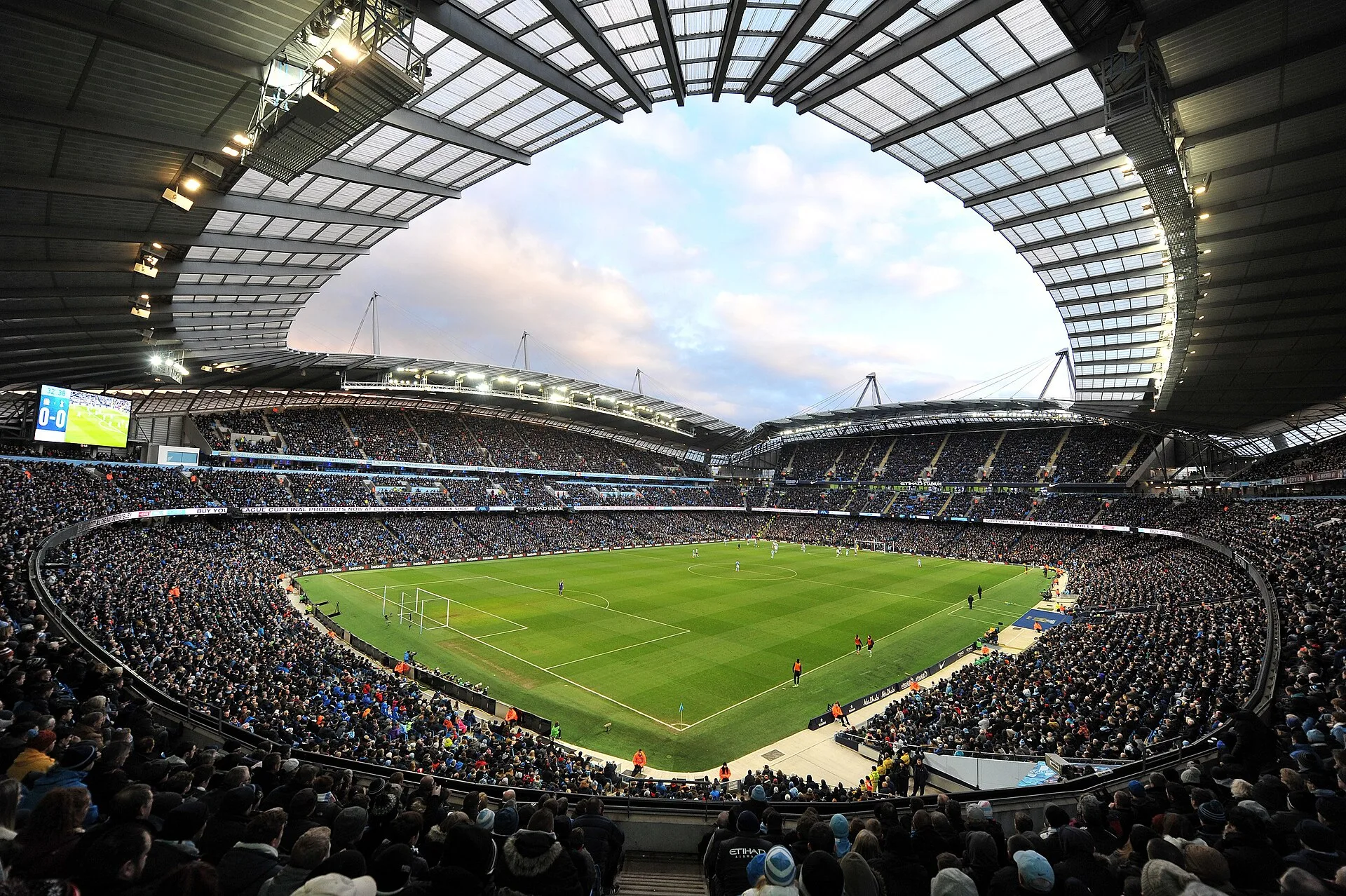 Open the featured image for Maresca Manchester City Record: Seven Wins, Then an AEK Test Pitch and stands at the Etihad Stadium in an archive photograph