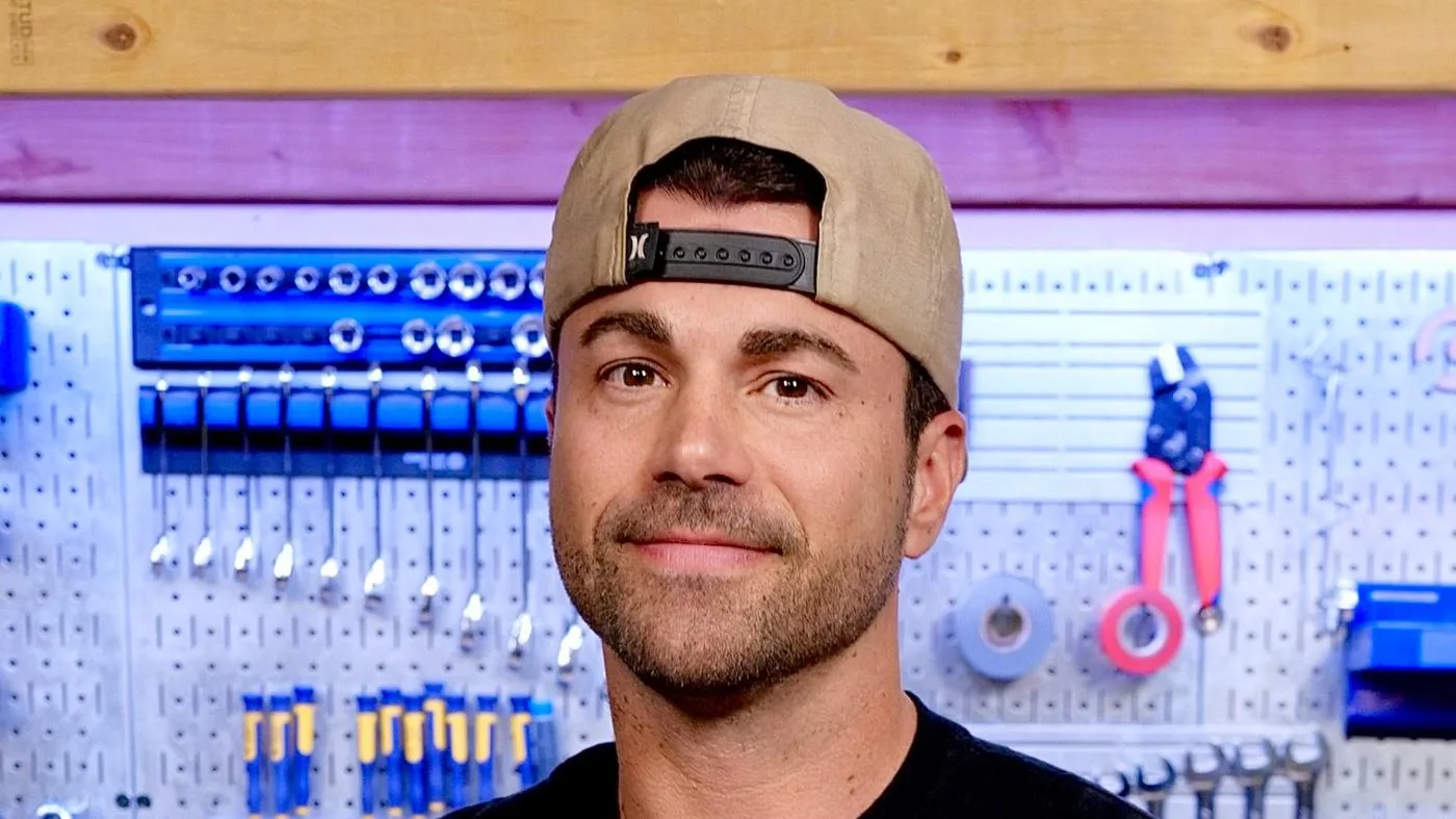Open the featured image for Mark Rober’s Class CrunchLabs: From Viral Builds to Science Lessons Mark Rober wearing a backwards cap in front of workshop tools, January 2025