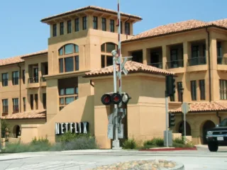 Netflix’s Los Gatos office building with its sign in July 2008