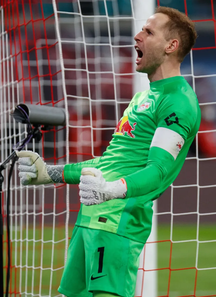 Péter Gulácsi celebrating in Leipzig goalkeeper kit in November 2021