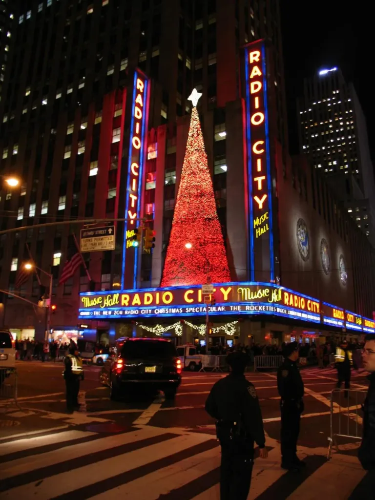 Radio City Music Hall lit at night with a Christmas tree decoration in 2011
