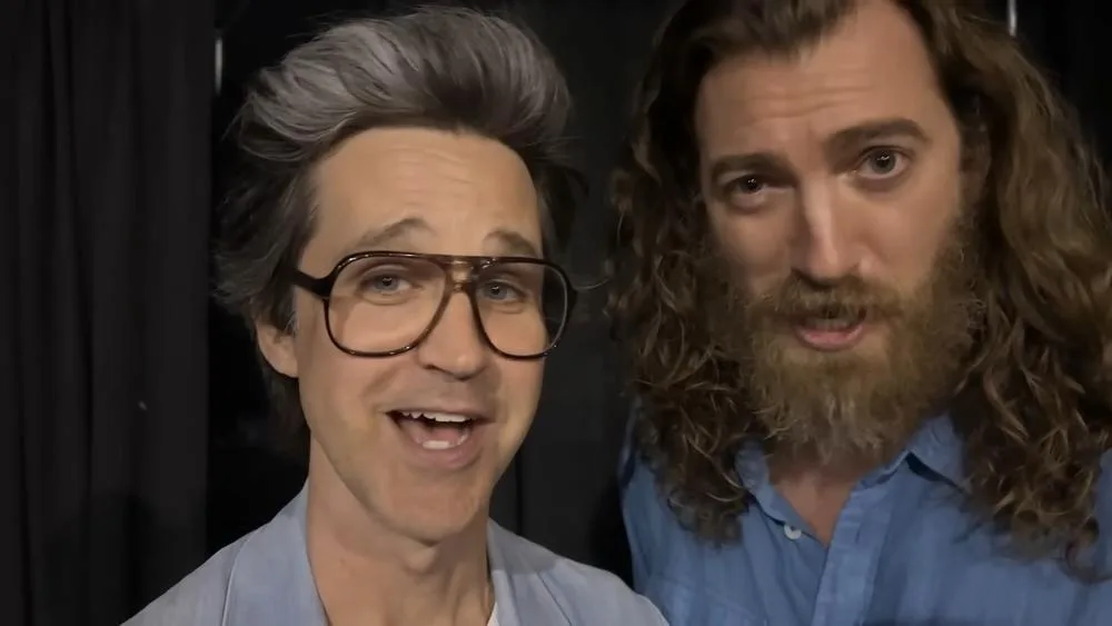 Link Neal at left and Rhett McLaughlin at right at VidCon 2025