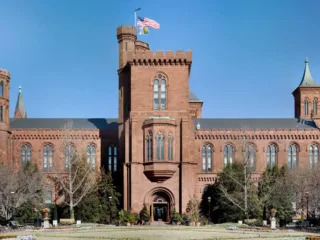 The red sandstone Smithsonian Castle viewed from its courtyard in Washington