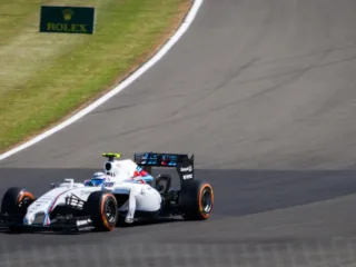 Susie Wolff driving a Williams FW36 at Silverstone during the 2014 British Grand Prix weekend