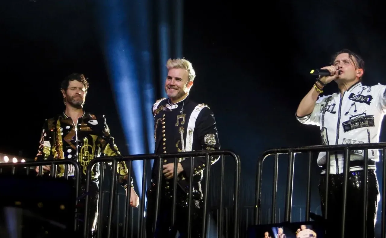 Howard Donald, Gary Barlow and Mark Owen performing with Take That in Glasgow in 2017
