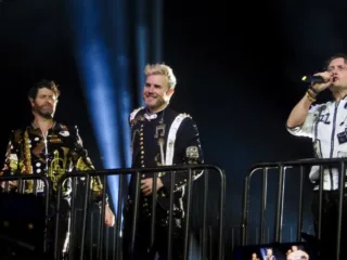 Howard Donald, Gary Barlow and Mark Owen performing with Take That in Glasgow in 2017